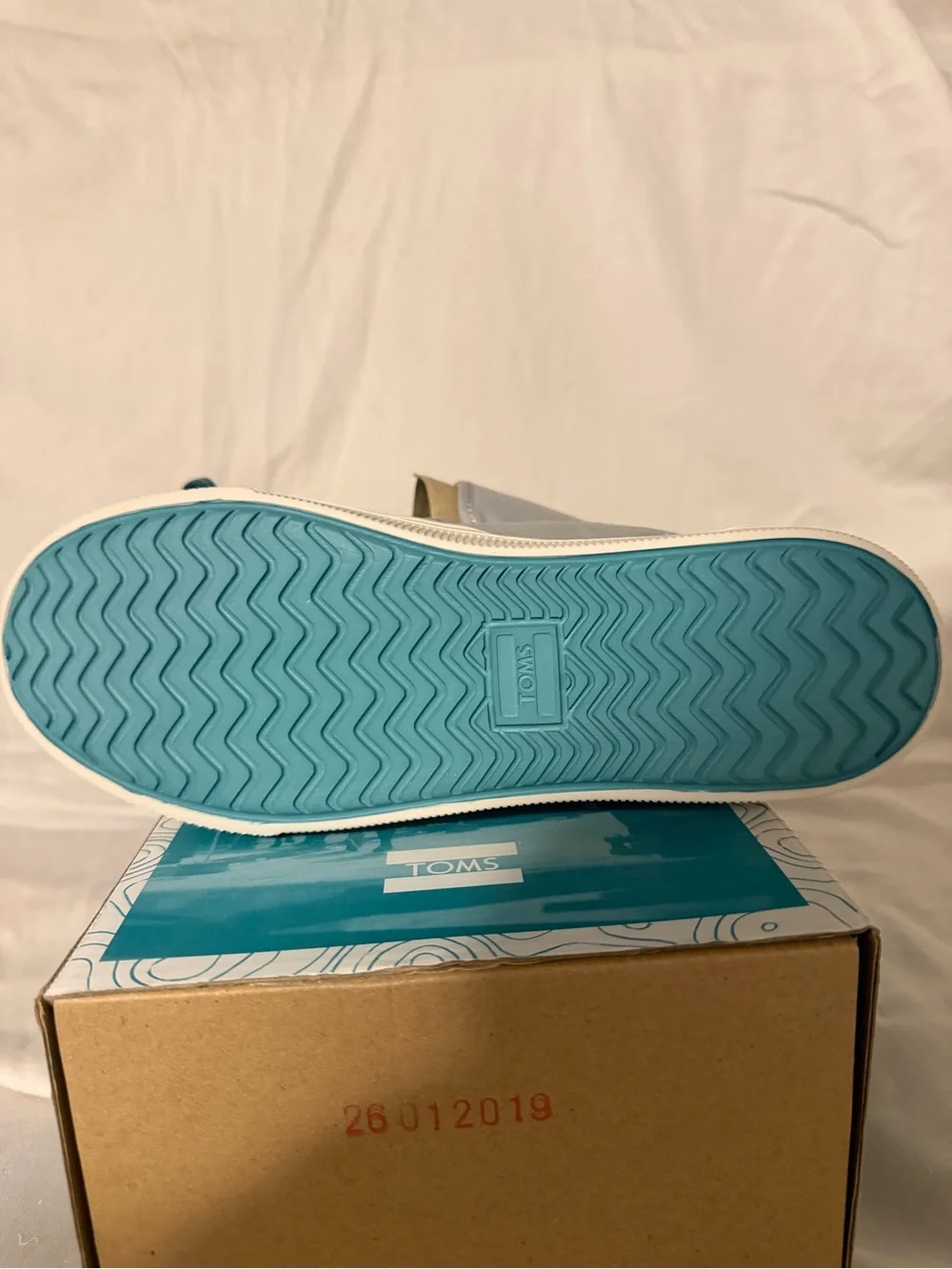 Toms Women’s Slip-On Sneakers in Light Gray and Cream Sole